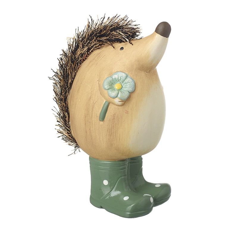 Pottery hedgehog ornament wearing green wellies and holding a flower